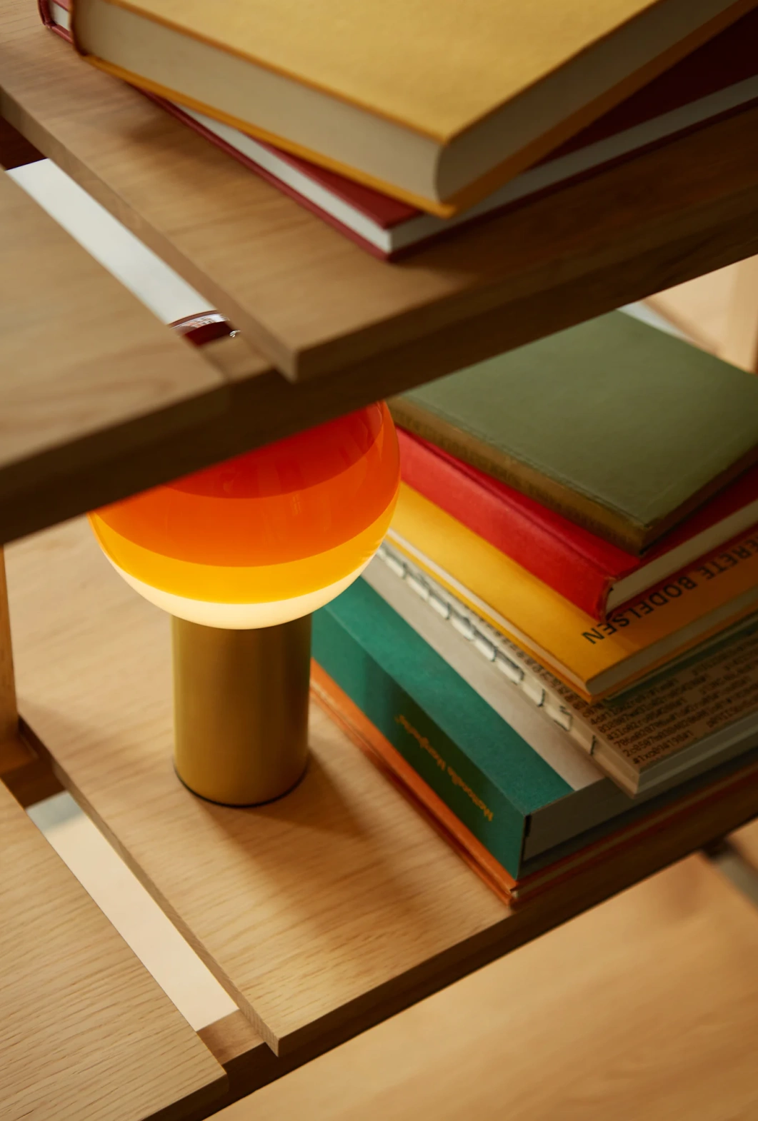 Marset :: Dipping table lamp, height 22.2 cm, amber and brass, wireless